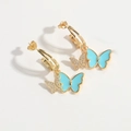 Golden bow drop earrings featuring teal enamel butterfly and sparkling zircon charms - Blue