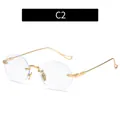 Gafas redondas sin montura anti luz azul con patillas doradas y grabados de estilo vintage - Oro (Redondo)