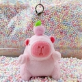 Pink capybara plush keychain with peach accessory and silver clasp on pastel foam balls - Pink Peach Style + Silver Clip