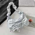 Detail of blue and white striped tote with bow embroidery and ruffled handle detail - Blue Grid Blue Bow