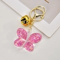 Portachiavi a farfalla in resina rosa glitterata con campanellino dorato e moschettone - Chiusura Oro Chiaro + Farfalla + Campanellino / Rosa