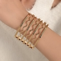 Chic multi-layer wide gold hollow geometric bracelet for women featuring wavy metal bars - Gold Multi-layer Wide Wave Cuff Bracelet