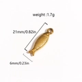 Macro detail of golden fish pendant with scale texture and 21mm size dimension - Fish 2