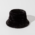 Close-up of the soft plush texture and premium faux fur material of the black bucket hat - Black