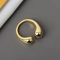 Polished golden alloy geometric waterdrop ring with an adjustable open design for women - Gold