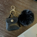 Mini black faux leather bag and fluffy fur pompom keychain with gold hardware detail - Snake Print / Black