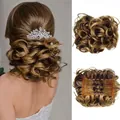 Macro detail of golden brown wavy hair bun with internal combs for secure attachment - 9H19 (Brown & Golden Highlights)
