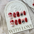 Christmas press-on nail set with red deer and snowman designs on a soft fur background - 544-Christmas Reindeer