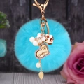 Porte-clés pompon bleu avec cœur strass gravé I love you et gland floral élégant - Cœur en bois + Pompon bleu ciel