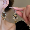 Detail showing vintage gold teardrop earrings with brown tiger eye stone and beaded fringe - Gold Brown Cat Eye Beige Tassel (64#)