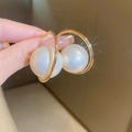 Close-up of elegant C-shaped gold hoop earrings with a large white pearl accent - 25# Gold Loop Pearl Earrings
