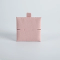 Close-up of pink suede jewelry display card with hanging loop and necklace slots - 6*6cm / Deep Pink