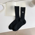 Classic black mid-calf socks with white FUN TIME embroidery and vertical ribbed texture - One Size / Black