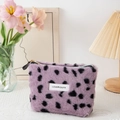 Purple leopard print plush makeup bag with Love Youth label and black zipper closure - Purple