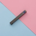 Detail of black rectangular bar pendant featuring a sparkling square blue gemstone insert - Black With Blue Zirconia