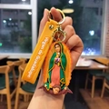 Porte-clés en caoutchouc Vierge de Guadalupe avec dragonne jaune et anneau doré brillant - Jaune