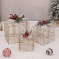 Three-piece set of lighted gold Christmas gift boxes with silver bows and red berries - HF20B-306 Gold Iron Art (No Light)