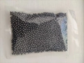 Deep grey deodorizing beads for cat litter trays in a sealed transparent plastic pouch - 200g (Bag)