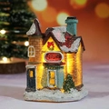 Lighted Christmas toy shop miniature with faux snow and warm LED glow for table decor - Style J