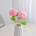 Pair of handmade pink crochet roses with green leaves in a modern white ceramic vase - Rose Pink