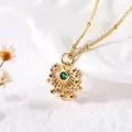 Gold fan-shaped heart pendant necklace with green center stone and colorful gems - B-Multicolor Starburst