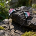 Detail of crystal cat ear headband with pink and blue gradient stones on mossy rock - Dark Green & Purple Red Cat Ears