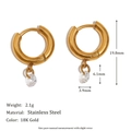Detail view of 18K gold-plated stainless steel earrings with white zircon pendants and specs - Single Crystal Pendant Style