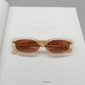 Chic translucent amber square sunglasses with brown lenses in a retro rectangular style - Champagne