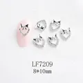 Détails de bijoux d'ongles cœur et nœud argentés avec strass et dimensions - Cœur argenté avec nœud strass blanc (LF7209)