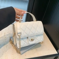 Chic white quilted crossbody bag with golden chain strap and top handle for women - White