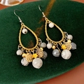 Detail of bohemian teardrop earrings with beads and gold discs on green velvet - Ear Hook - Grey Water Pattern Stone