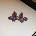 Macro shot of vintage butterfly earrings featuring red gemstones and blue turquoise beads - Red & Blue Vintage Butterfly (13#)