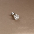 Macro detail of silver surgical steel cartilage stud featuring a sparkling zircon flower - Silver White Zirconia (Cluster Flower Shape)