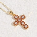 Cross pendant necklace in 14K gold plating with orange and white cubic zirconia stones - Red