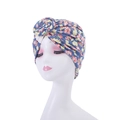 Detail of sky blue floral turban hat with vintage knot design and vibrant flower prints - Style 20-Sky Blue Red Yellow Floral Twist Knot