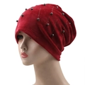 Detail of burgundy velvet beanie featuring rows of decorative silver beads and soft fabric - 56-61cm / Red