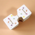 Macro shot of bifold paper display cards with floral prints for hair accessories - Butterfly - 5.4*11.7cm