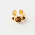 Detailed macro view of vintage gold ring with three tiger eye stones and hammered texture - Adjustable Open / Three Brown Stones