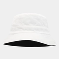 Detail of white corduroy bucket hat showing textured fabric and reinforced brim stitching - White