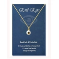 Macro detail of golden stainless steel chain with a classic evil eye amulet pendant - 18K Gold White Bead (Gold Eye)