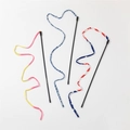 Close-up of three colorful fabric ribbon cat wands with starry and gradient patterns - Black Rod Cloth Strip