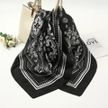 Detailed view of paisley silk square scarf tied on a white handbag for styling - 70-70cm / Black Paisley (FJ016-2)