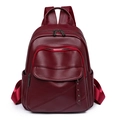 Burgundy faux leather backpack for women with litchi texture and rivet details - Burgundy