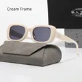 Detail der cremefarbenen Rechteck-Sonnenbrille mit polarisierten Gläsern und Brillenetui - Nicht polarisiert / Cremeweißer Rahmen Graue Gläser