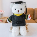White plush graduation teddy bear with black academic gown and mortarboard hat - White Braided Graduation Bear - Yellow Collar / 30 cm