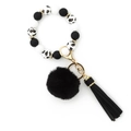 Silicone bead keychain bracelet in black and white with pompom and tassel charms - Black