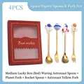 Golden 4-piece space themed spoon and fork set with astronaut icons in red gift box - Space Red 4PCS (Waving Astronaut Spoon/Planet Fork/Rocket Spoon/Yellow Astronaut Fork)