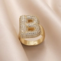 Gold plated open ring featuring letter B with sparkling cubic zirconia on silk - Small / Letter B