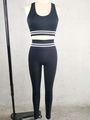 Ensemble de yoga noir deux pièces avec haut dos nageur et legging taille haute à bandes rayées - S / Haut Et Bas / Noir