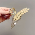 Elegant gold wheat ear hair claw clip with pearls and rhinestones on a gray background - Elegant Wheat Ear Gold